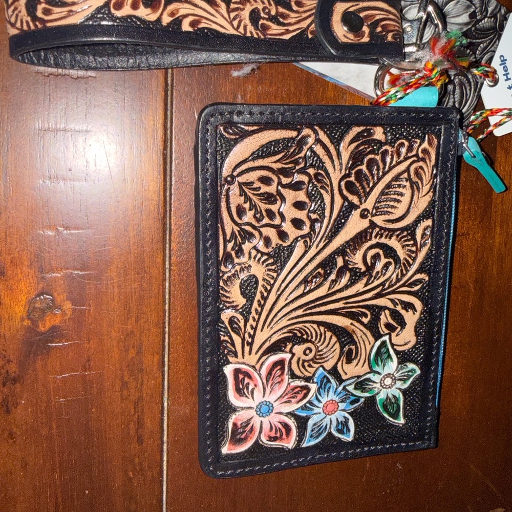 Myra tooled leather wristlet